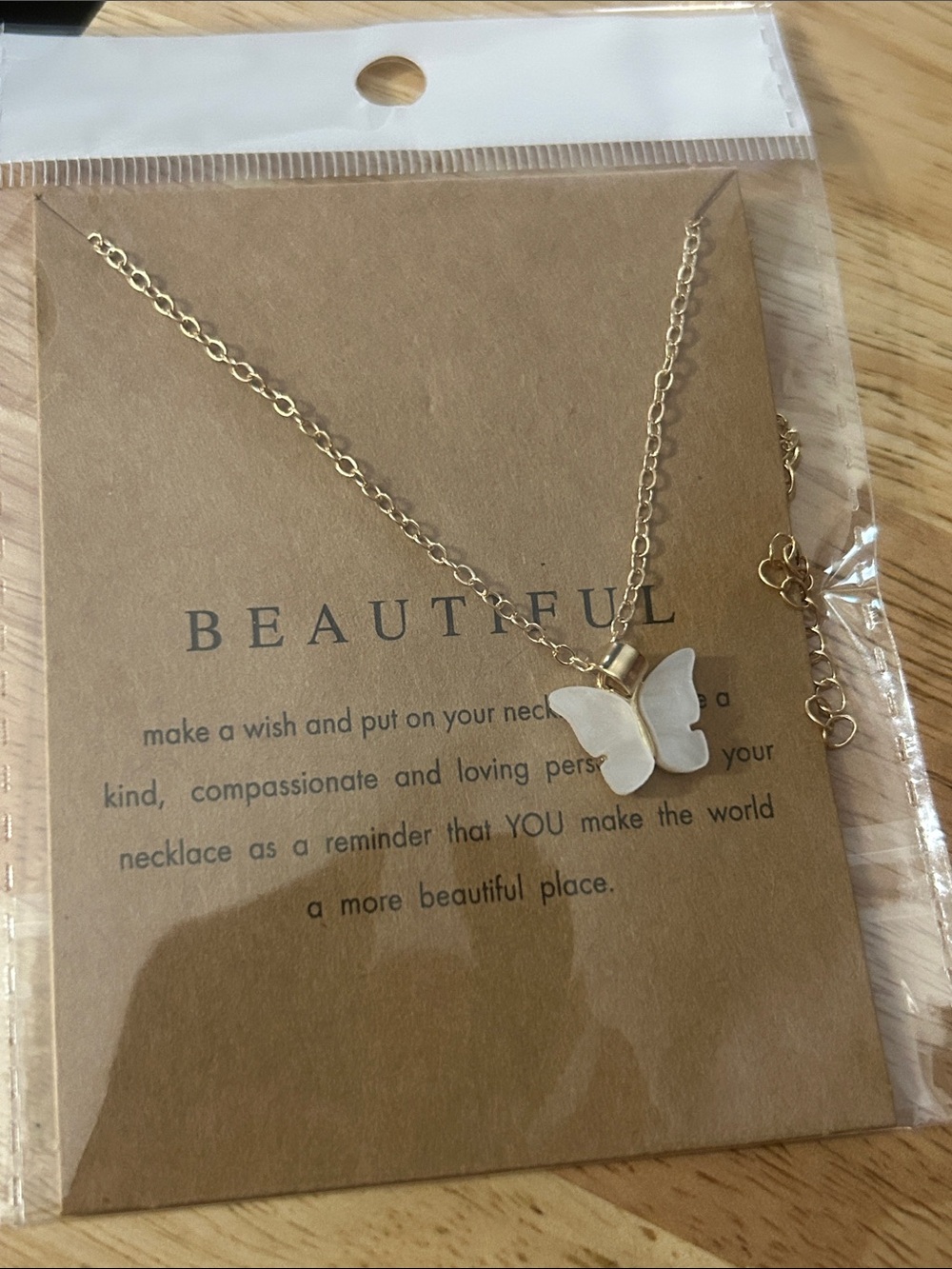 Butterfly Pendant Necklace in White and Gold -